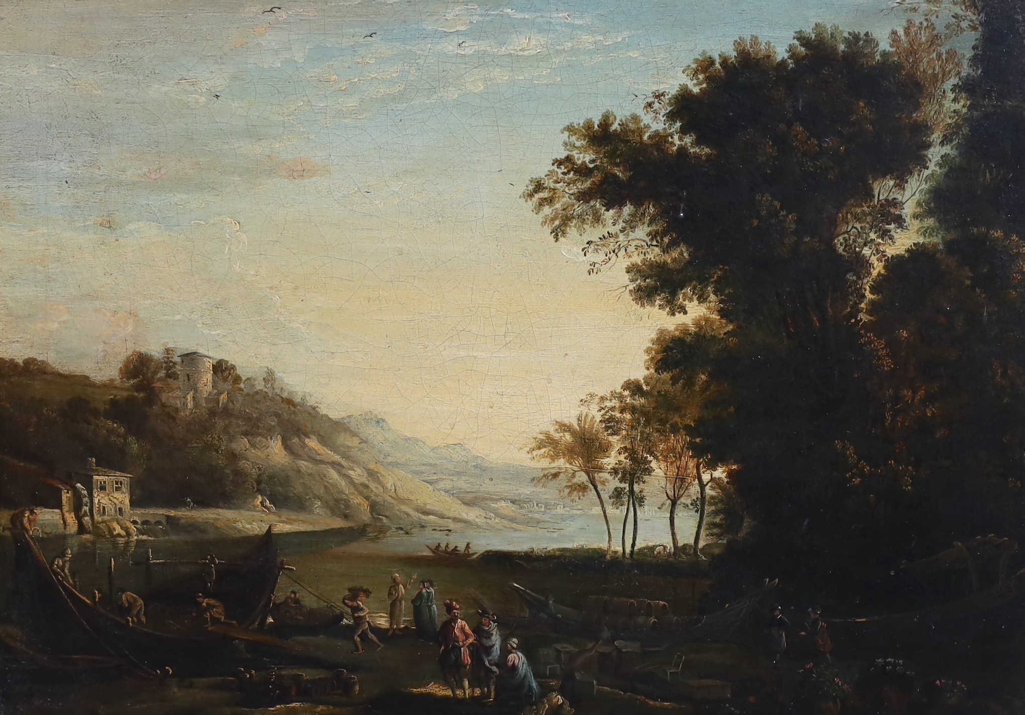 Late 18th century English School, Italianate landscape with figures loading barrels into a boat, oil on canvas, 43 x 61cm